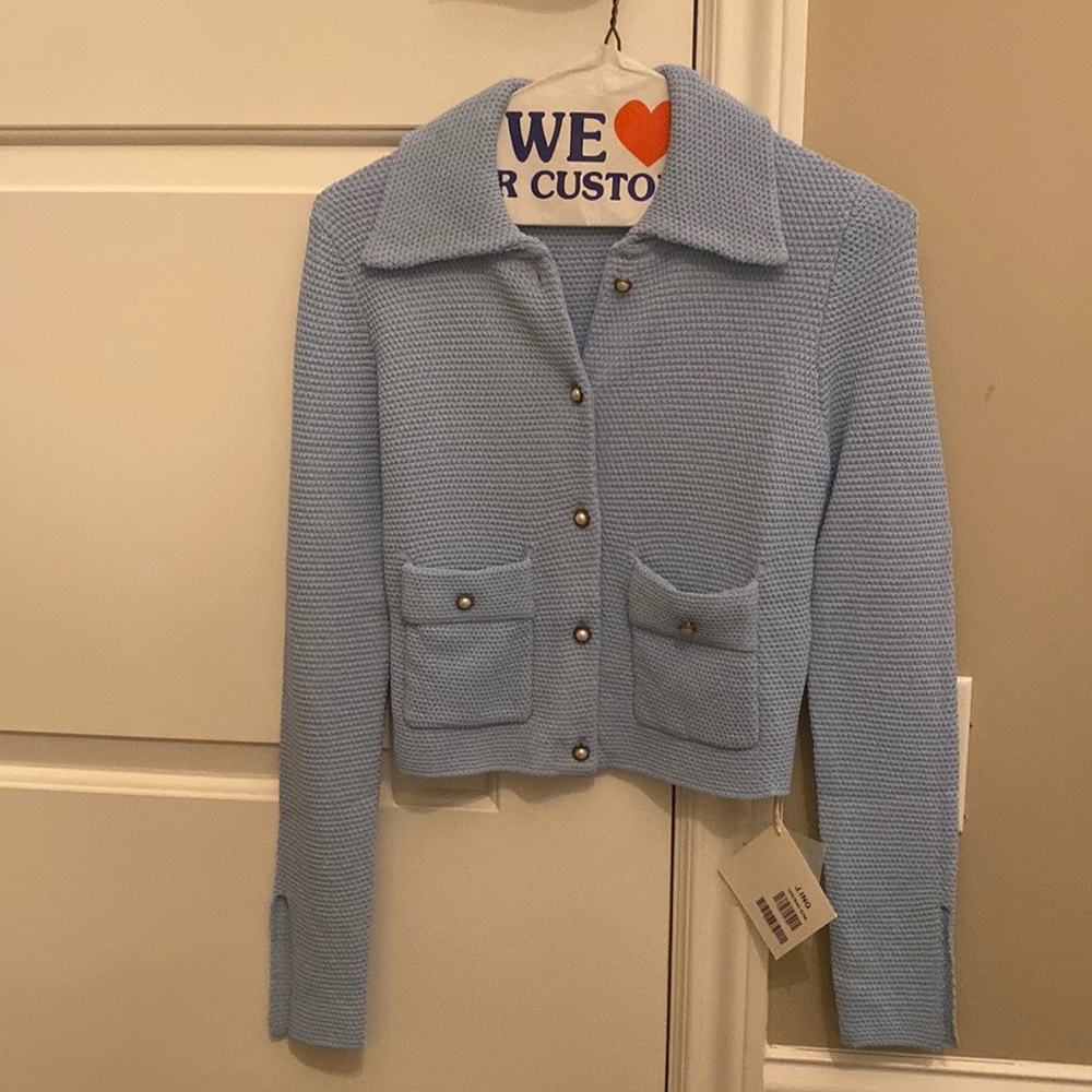 Blue knit pearl collar top